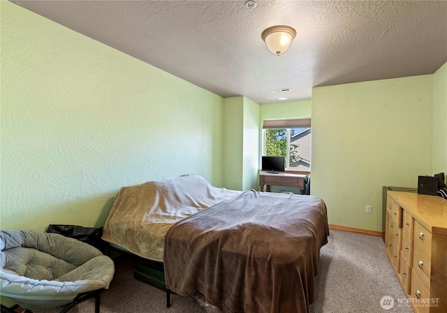 2541 Fancher Heights Blvd, East Wenatchee, WA 98802 - bedroom with light carpet, baseboards, and a textured ceiling