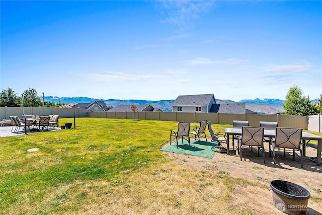 2541 Fancher Heights Blvd, East Wenatchee, WA 98802 - view of yard with a patio, a mountain view, and outdoor dining space