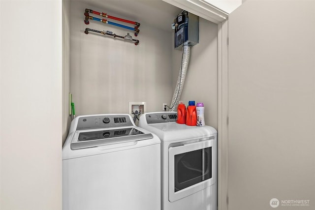 washroom with washer and clothes dryer