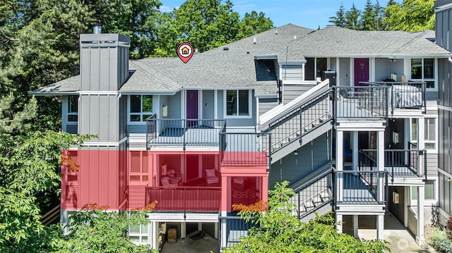 3908 243rd Pl SE Unit Q-203, Bothell, WA 98021 - view of building exterior with stairway