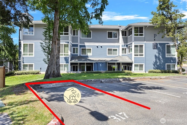 3908 243rd Pl SE Unit Q-203, Bothell, WA 98021 - view of property with uncovered parking