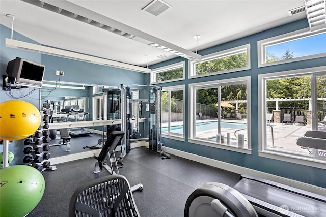 3908 243rd Pl SE Unit Q-203, Bothell, WA 98021 - gym featuring healthy amount of natural light and baseboards
