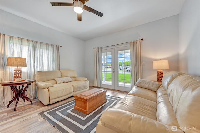 612 Hunt Ave, Sumner, WA 98390 - living room featuring ceiling fan, french doors, and light wood finished floors