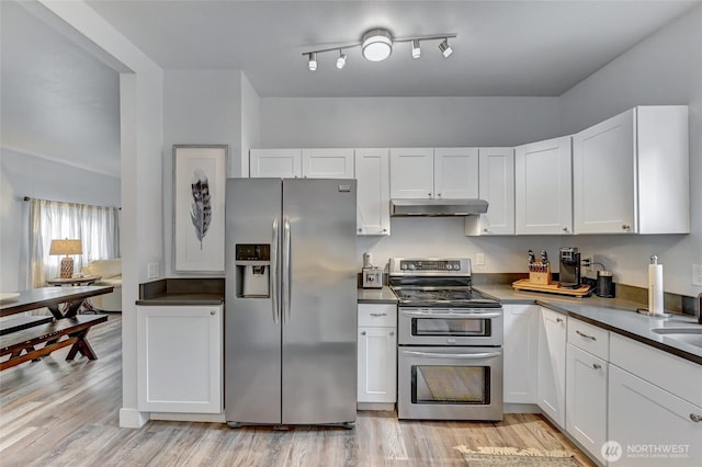 612 Hunt Ave, Sumner, WA 98390 - kitchen with appliances with stainless steel finishes, under cabinet range hood, and white cabinets