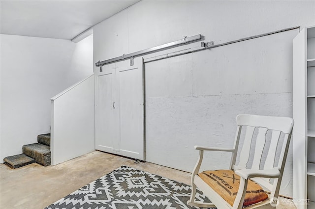612 Hunt Ave, Sumner, WA 98390 - sitting room featuring stairs and unfinished concrete flooring