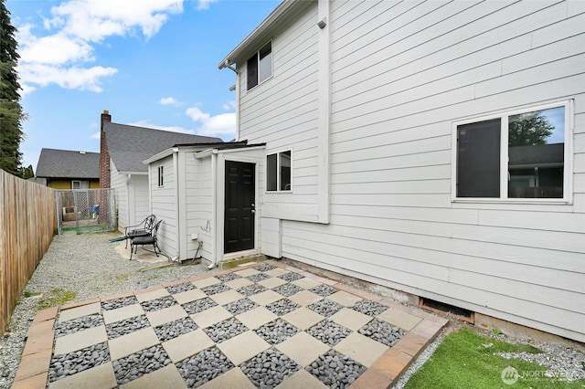 612 Hunt Ave, Sumner, WA 98390 - rear view of property featuring a fenced backyard and a patio