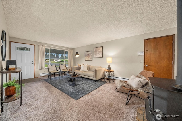 7052 S I St, Tacoma, WA 98408 - living area featuring a textured ceiling, carpet flooring, and baseboard heating