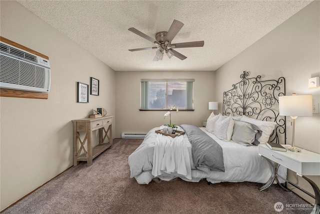 7052 S I St, Tacoma, WA 98408 - carpeted bedroom with a textured ceiling, a wall mounted AC, a baseboard heating unit, and a ceiling fan