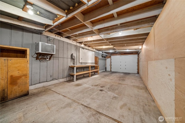7052 S I St, Tacoma, WA 98408 - unfinished below grade area with an AC wall unit