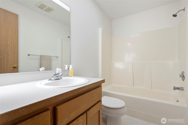 1274 Admirals Dr, Coupeville, WA 98239 - full bathroom with toilet, vanity, and bathtub / shower combination