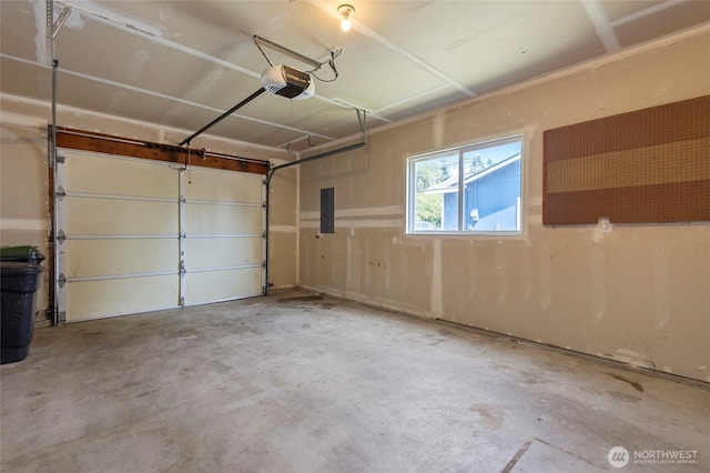 1274 Admirals Dr, Coupeville, WA 98239 - garage featuring a garage door opener and electric panel