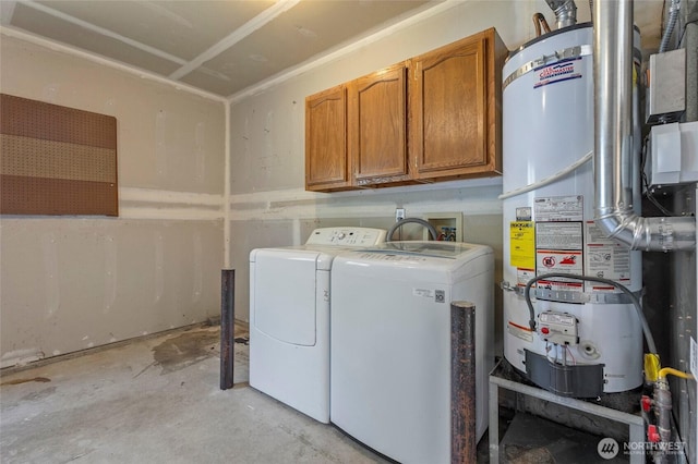 1274 Admirals Dr, Coupeville, WA 98239 - laundry room with cabinet space, strapped water heater, and washer and dryer