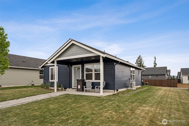 view of front of home featuring a patio and crawl space