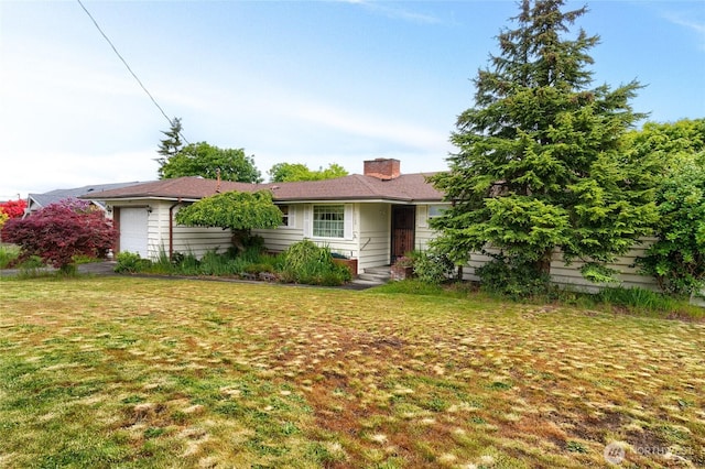 2129 H Ave, Anacortes, WA 98221 - view of front of property with an attached garage, a chimney, and a front lawn