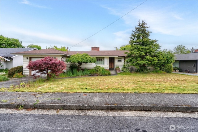 2129 H Ave, Anacortes, WA 98221 - ranch-style home featuring an attached garage, a front lawn, a chimney, and asphalt driveway