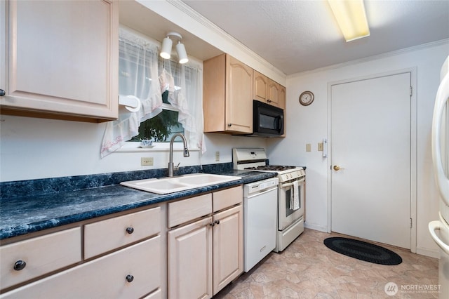 2129 H Ave, Anacortes, WA 98221 - kitchen featuring a sink, white appliances, dark countertops, light brown cabinetry, and stone finish flooring