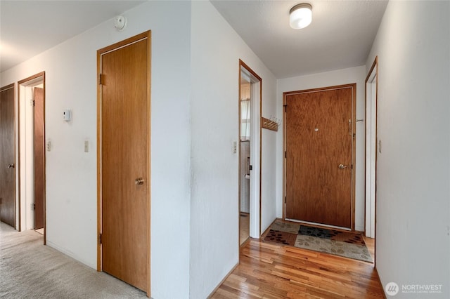 2129 H Ave, Anacortes, WA 98221 - corridor featuring light wood-style flooring and baseboards