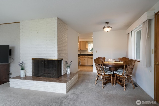 2129 H Ave, Anacortes, WA 98221 - dining room featuring light colored carpet and a fireplace