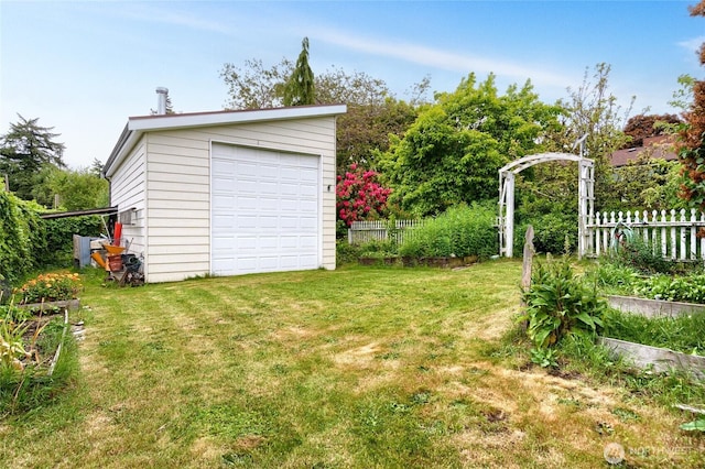 2129 H Ave, Anacortes, WA 98221 - view of yard featuring an outdoor structure and a detached garage