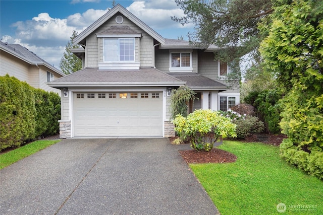 908 274th Way SE, Sammamish, WA 98075 - view of front of home with driveway, a garage, roof with shingles, stone siding, and a front lawn