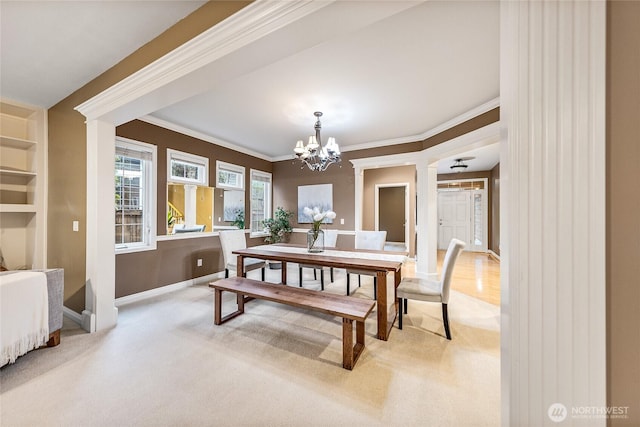 908 274th Way SE, Sammamish, WA 98075 - dining space featuring a chandelier, light carpet, baseboards, ornamental molding, and built in shelves