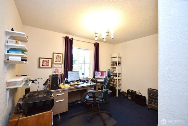 office space with a chandelier and dark colored carpet