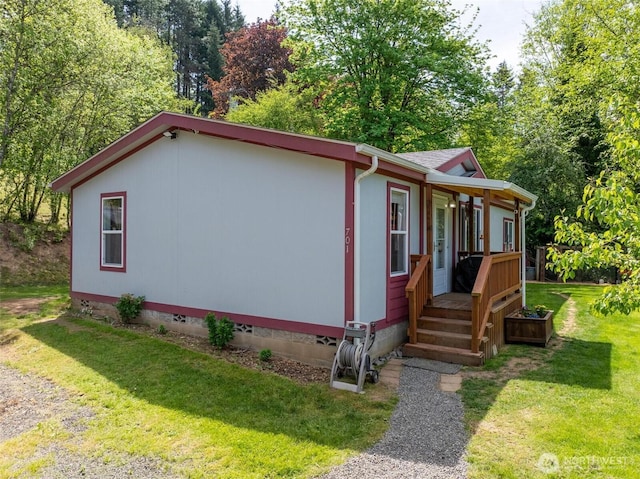 view of front facade featuring a front yard and crawl space