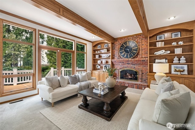 9416 NE 25th St, Clyde Hill, WA 98004 - living room featuring built in features, french doors, a fireplace, beamed ceiling, and carpet