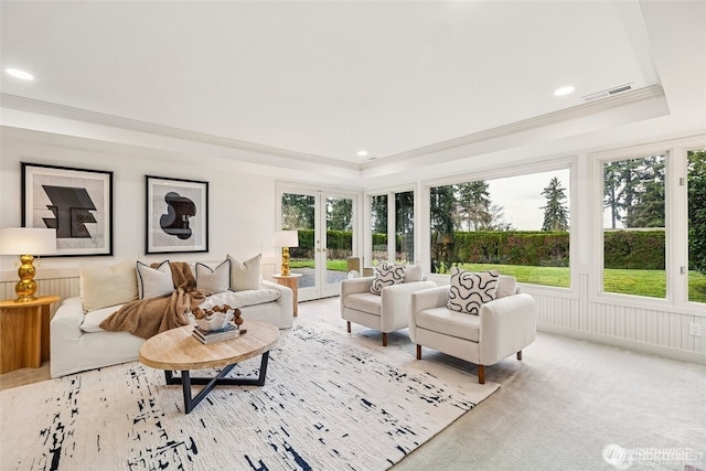 9416 NE 25th St, Clyde Hill, WA 98004 - living room featuring a tray ceiling, crown molding, healthy amount of natural light, recessed lighting, and french doors