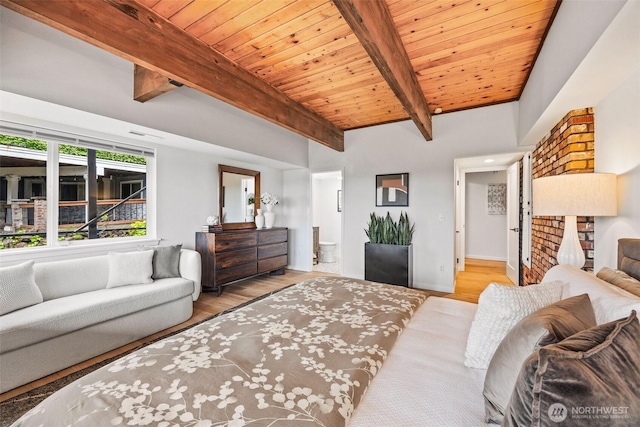 4950 N Lexington St, Tacoma, WA 98407 - bedroom with wood finished floors, wood ceiling with exposed beams, baseboards, and ensuite bathroom