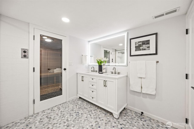 4950 N Lexington St, Tacoma, WA 98407 - full bath with baseboards, recessed lighting, double vanity, tile patterned floors, and a tile shower