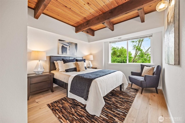 4950 N Lexington St, Tacoma, WA 98407 - bedroom featuring hardwood / wood-style floors and wooden ceiling with exposed beams