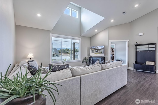 819 N Newport Loop, East Wenatchee, WA 98802 - living room with high vaulted ceiling, dark wood finished floors, recessed lighting, and baseboards