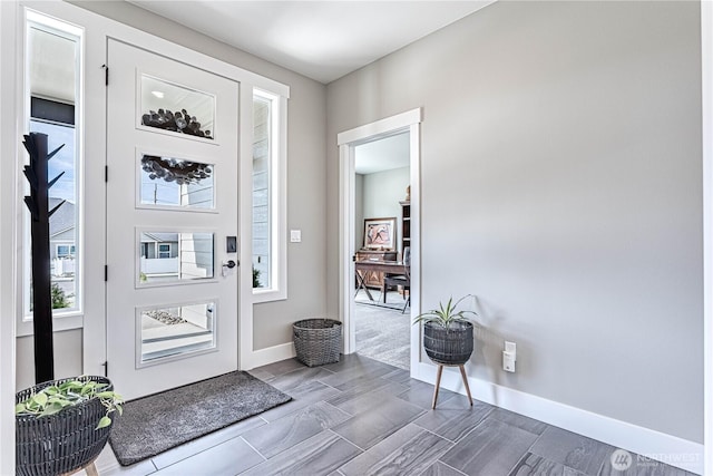 819 N Newport Loop, East Wenatchee, WA 98802 - foyer featuring baseboards and wood finish floors