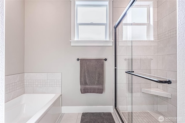 819 N Newport Loop, East Wenatchee, WA 98802 - full bathroom with healthy amount of natural light, tile patterned floors, a stall shower, and a garden tub