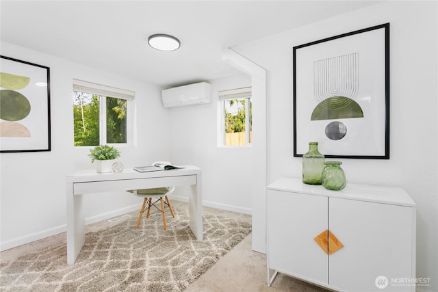carpeted home office with an AC wall unit, plenty of natural light, and baseboards