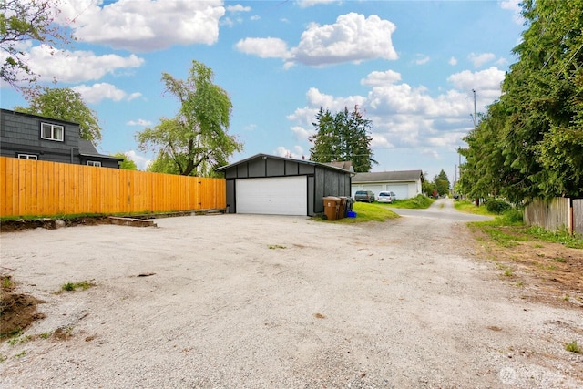detached garage with fence
