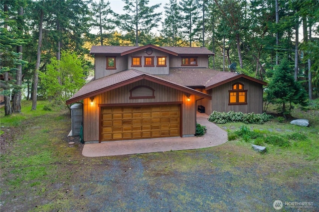 244 Davison Head Dr, Friday Harbor, WA 98250 - chalet / cabin with roof with shingles, driveway, and a garage
