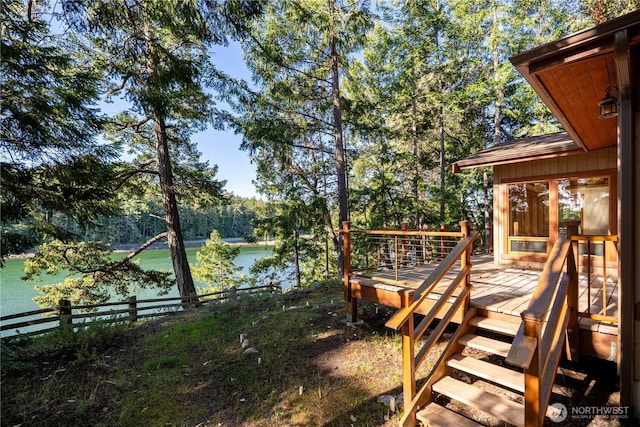 244 Davison Head Dr, Friday Harbor, WA 98250 - view of yard with a deck with water view and fence