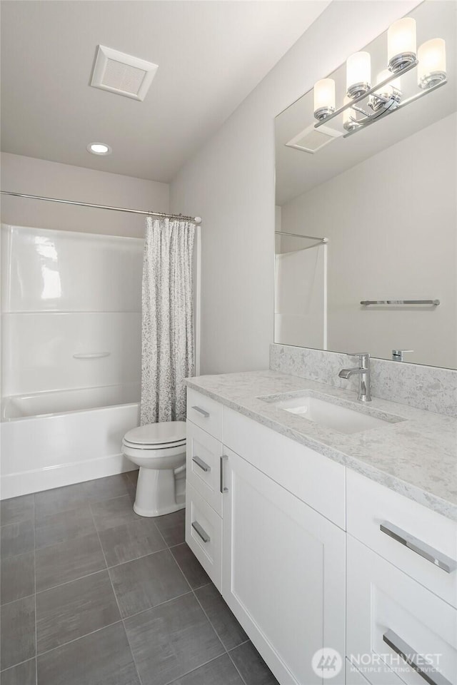 4012 129th Pl SE Unit 2, Bellevue, WA 98006 - bathroom with toilet, tile patterned flooring, vanity, and shower / bath combination with curtain