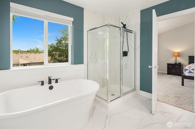 full bathroom featuring a marble finish shower, a freestanding bath, connected bathroom, baseboards, and marble finish floors