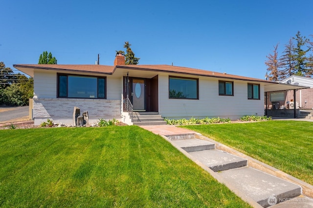 303 Patrick Rd, Ephrata, WA 98823 - single story home with a chimney, a front lawn, and entry steps