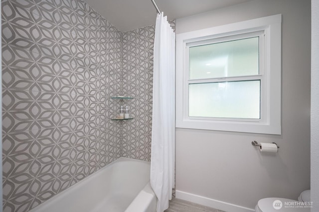 303 Patrick Rd, Ephrata, WA 98823 - bathroom featuring toilet, shower / bath combo, and baseboards