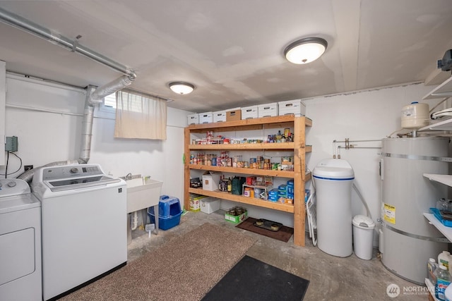303 Patrick Rd, Ephrata, WA 98823 - laundry area featuring washing machine and clothes dryer and strapped water heater