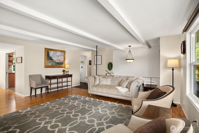 12555 SE 72nd St, Newcastle, WA 98056 - living room with wood finished floors, beamed ceiling, and baseboards