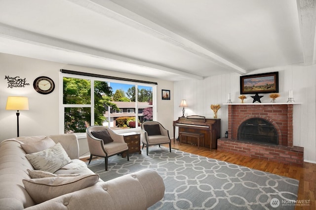 12555 SE 72nd St, Newcastle, WA 98056 - living room featuring wood finished floors, beamed ceiling, and a brick fireplace