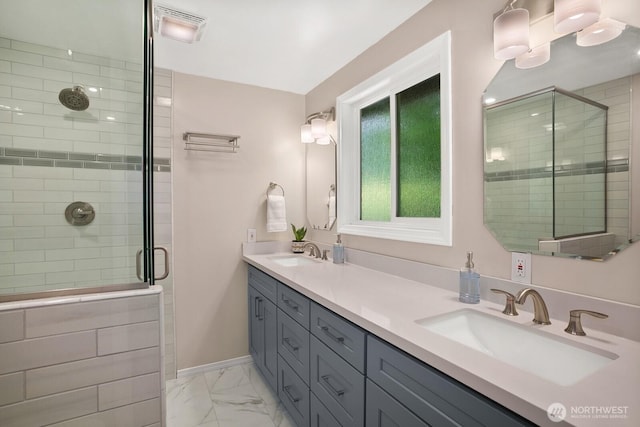 12555 SE 72nd St, Newcastle, WA 98056 - full bathroom featuring a shower stall, marble finish floors, double vanity, and baseboards
