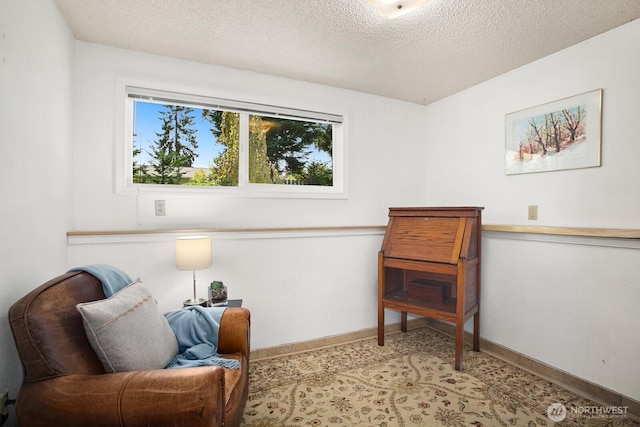 12555 SE 72nd St, Newcastle, WA 98056 - sitting room featuring a textured ceiling and baseboards