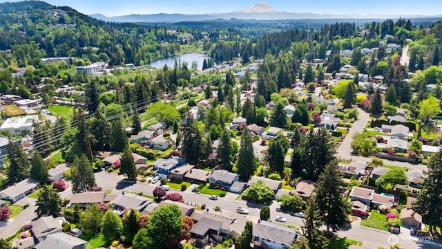 12555 SE 72nd St, Newcastle, WA 98056 - bird's eye view of a heavily wooded area and a mountain backdrop