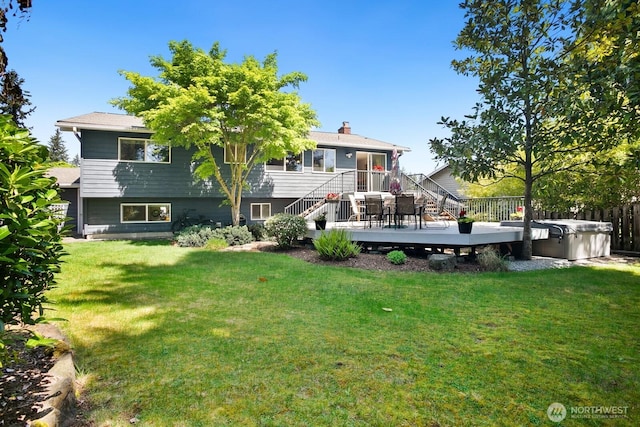 12555 SE 72nd St, Newcastle, WA 98056 - back of house with a wooden deck, stairs, a lawn, and a chimney